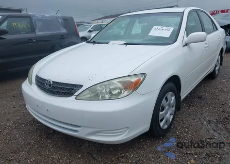 2003 Toyota Camry Le from USA, damaged, VIN 4T1BE32K93U159909